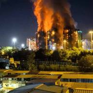 China: ya son 55 los muertos por el enorme incendio de rascacielos en Hong Kong